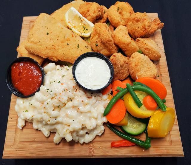Fried seafood platter with dipping sauces