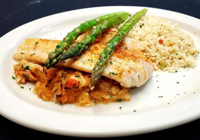 Fish entree with asparagus and rice